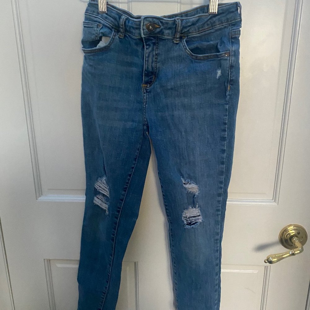 blue ripped jeans